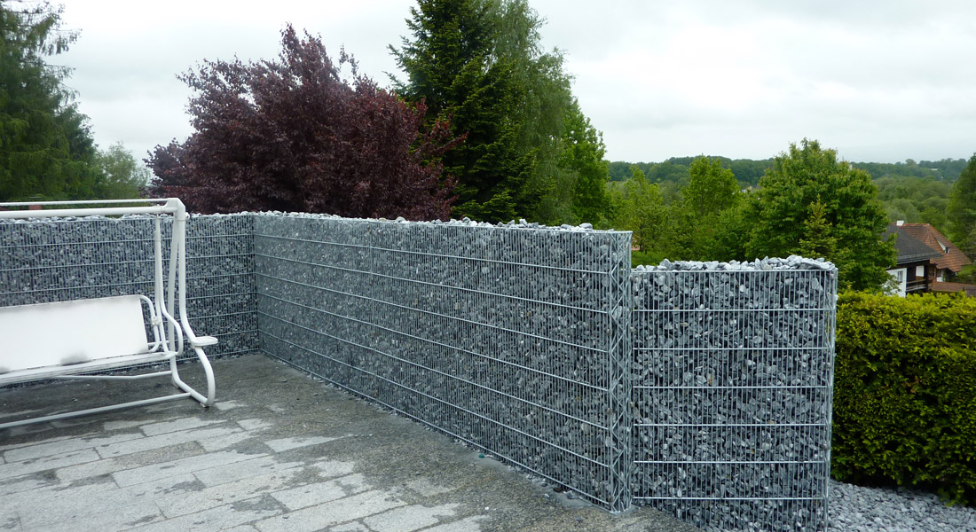 Clôture gabion comme pare-vent pour terrasses